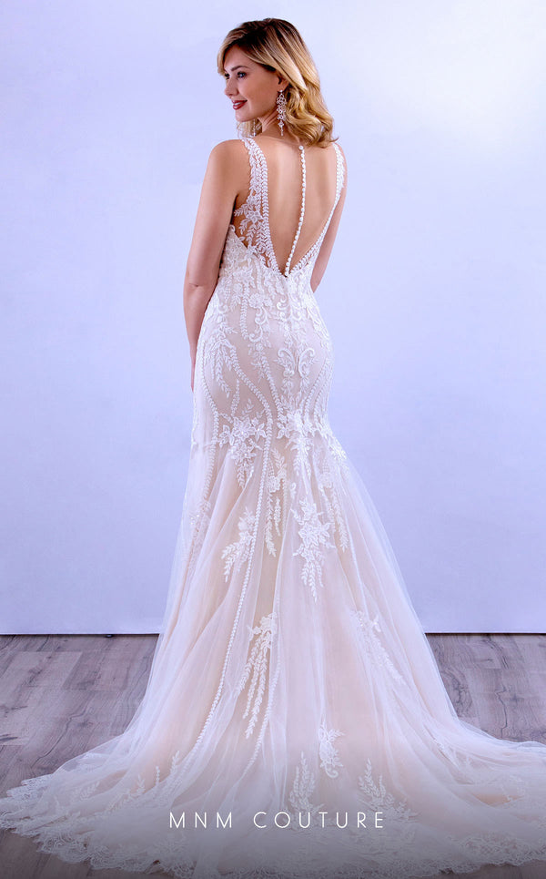 MNM Couture 10093 mermaid gown with lace-adorned bodice and timelessly flared silhouette.| Couture Shop LA