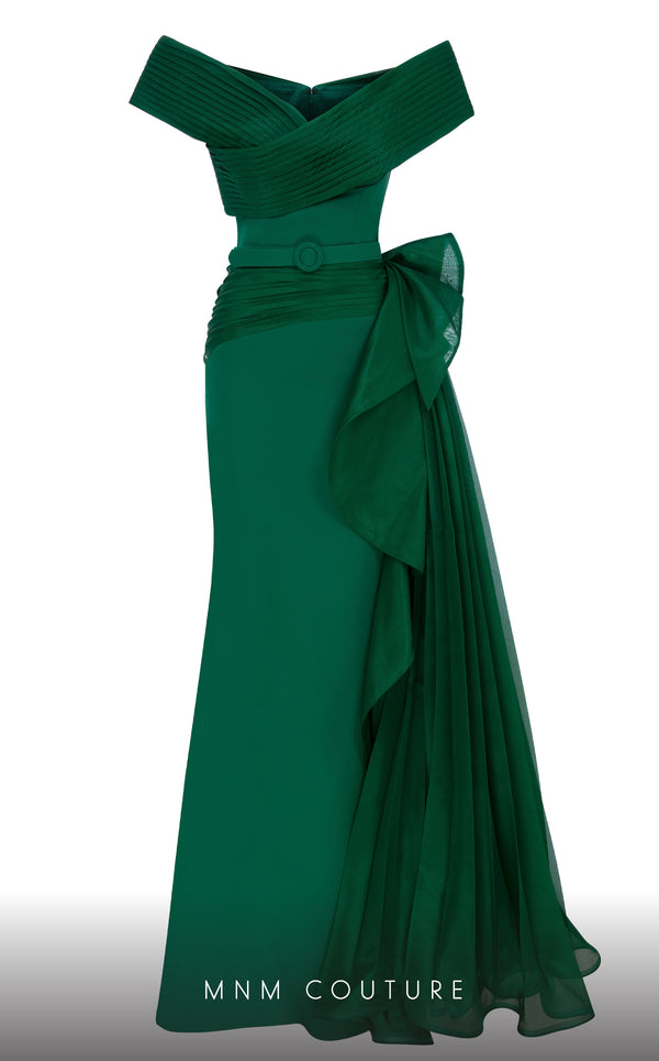 A sophisticated MNM Couture 2692 off-shoulder mermaid gown featuring pleated foldover details, ruffled side peplums, and a sweeping train. | Couture Shop LA