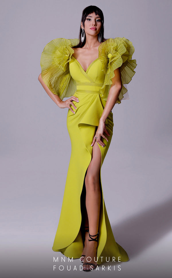 A striking MNM Couture 2712 mermaid gown with sheer ruffle sleeves, a plunging V-neckline, a high slit, and a sweep train in crepe fabric. | Couture Shop LA
