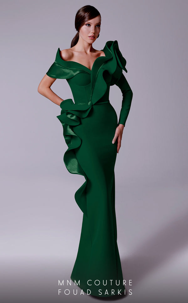 An elegant MNM Couture 2714 satin-crepe mermaid gown featuring long sleeves, ruffled details, a V-neckline, and a rosette accent for added flair. | Couture Shop LA