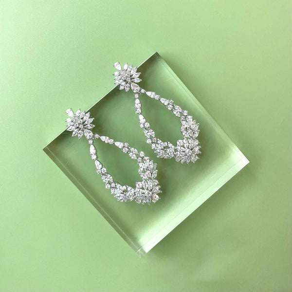 AUE427 silver metal earrings adorned with oval rhinestones| Couture Shop LA