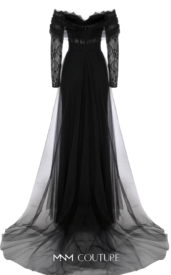 MNM Couture Style B1141 featuring a flared black organza gown with an off-the-shoulder sweetheart neckline, long sleeves, and a long, flowing train cape at the back.| Couture Shop LA.