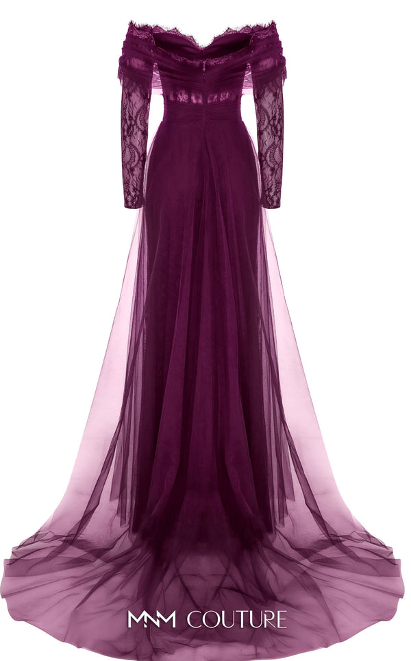 MNM Couture Style B1141 featuring a flared black organza gown with an off-the-shoulder sweetheart neckline, long sleeves, and a long, flowing train cape at the back.| Couture Shop LA.