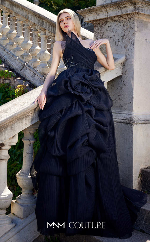 MNM Couture B1168 sleeveless tulle gown with a pleated, beaded bodice, asymmetric neckline, and a full A-line skirt with side ruffles. | Couture Shop LA