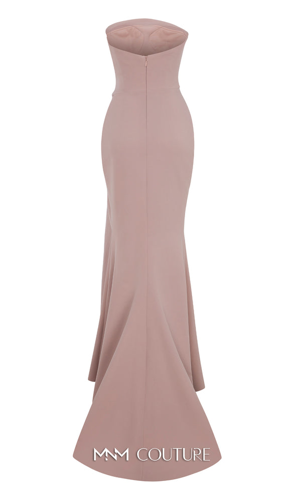 MNM Couture Style B1171 showcasing a pink sleeveless column dress in rayon crepe with a straight-across neckline, rhinestone triangle accent on the bust, and pleated waist detail. | Couture Shop LA