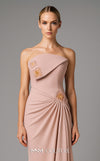 MNM Couture Style B1171 showcasing a pink sleeveless column dress in rayon crepe with a straight-across neckline, rhinestone triangle accent on the bust, and pleated waist detail. | Couture Shop LA