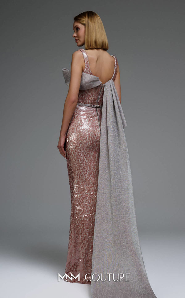 MNM Couture E0108 sequin-embellished fitted column gown with strap sleeves, asymmetric sweetheart neckline, and a flowing cape with a train. | Couture Shop LA