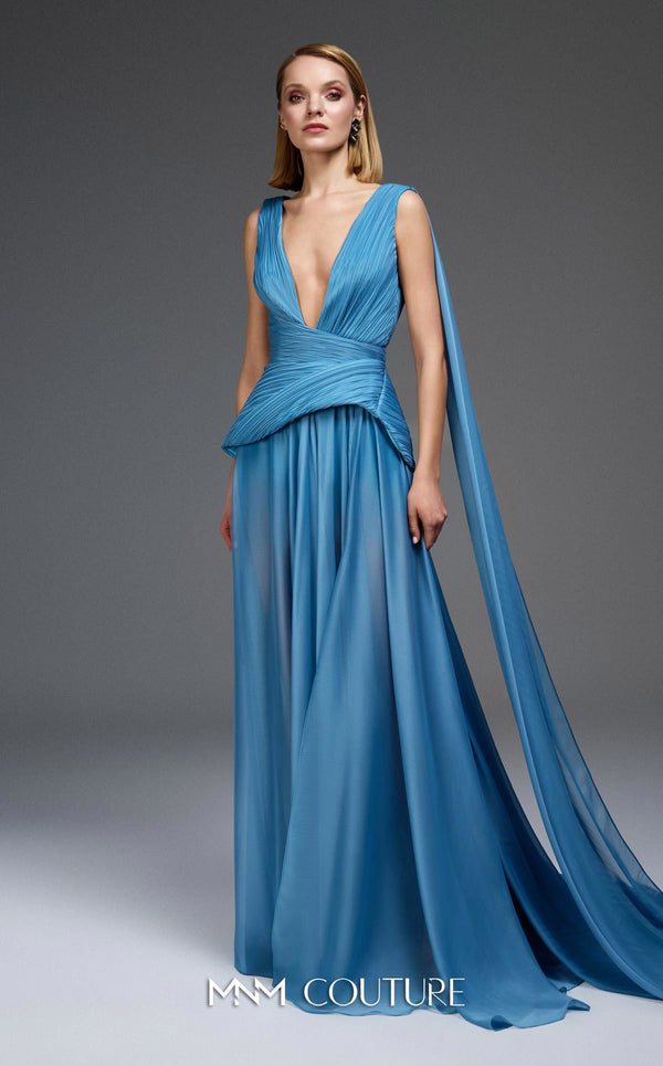MNM Couture Style E0121 featuring a blue organza gown with a deep V-neckline, pleated corset-style bodice, an asymmetric peplum detail, and a long train. | Couture Shop LA