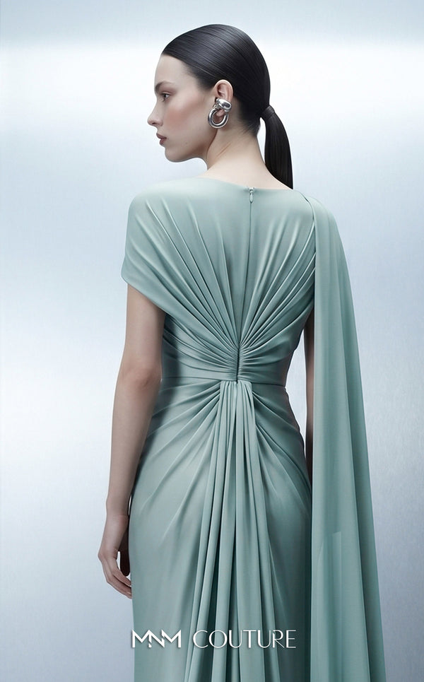 MNM Couture E0160 satin and chiffon draped column gown with asymmetric dual sleeves, satin knot waist, cape sleeve, and back fan-pleat detail | Couture Shop LA.