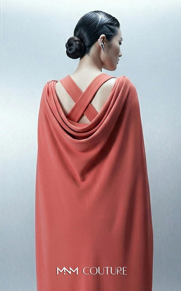 Long straight fitted crepe evening gown with an asymmetrical design and removable cape showcasing MNM Couture Style E0164 | Couture Shop LA.