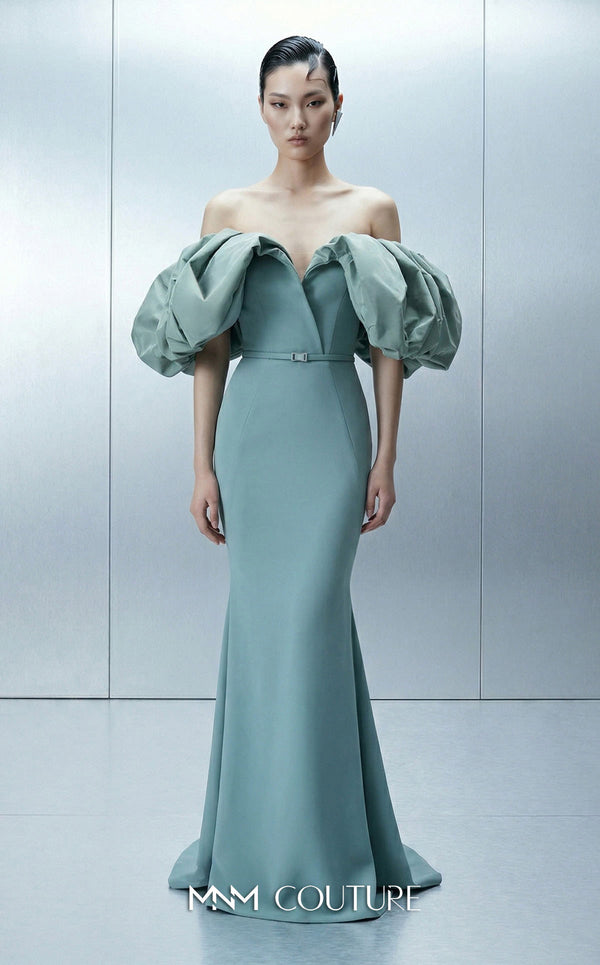 Long straight fitted crepe dress featuring an asymmetrical bodice and puffy taffeta sleeves for MNM Couture Style E0165 | Couture Shop LA.