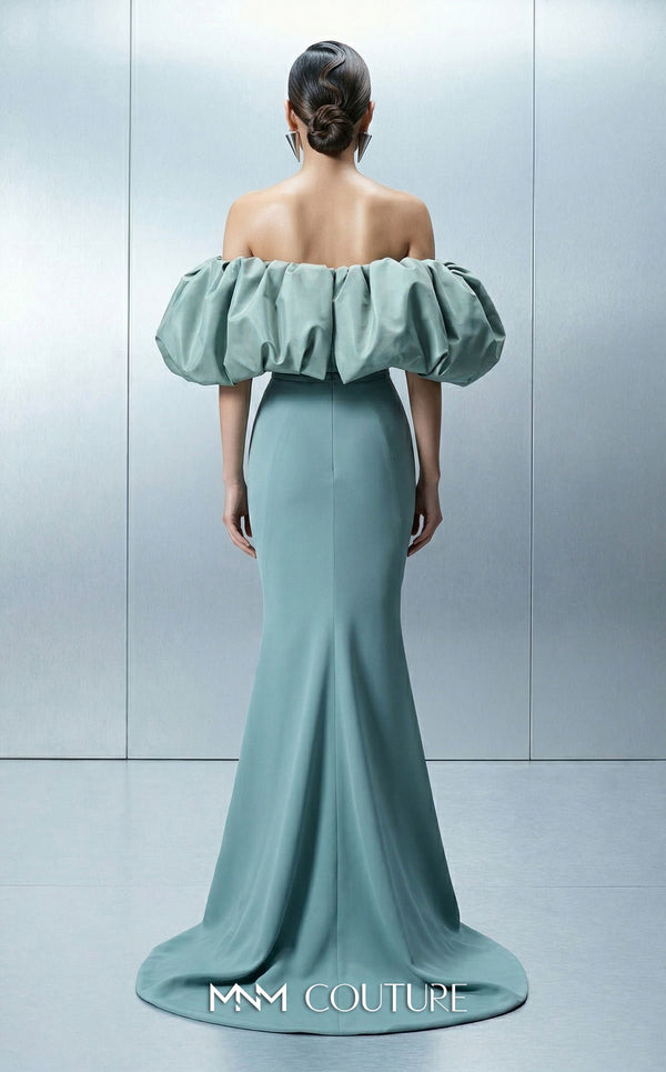 Long straight fitted crepe dress featuring an asymmetrical bodice and puffy taffeta sleeves for MNM Couture Style E0165 | Couture Shop LA.