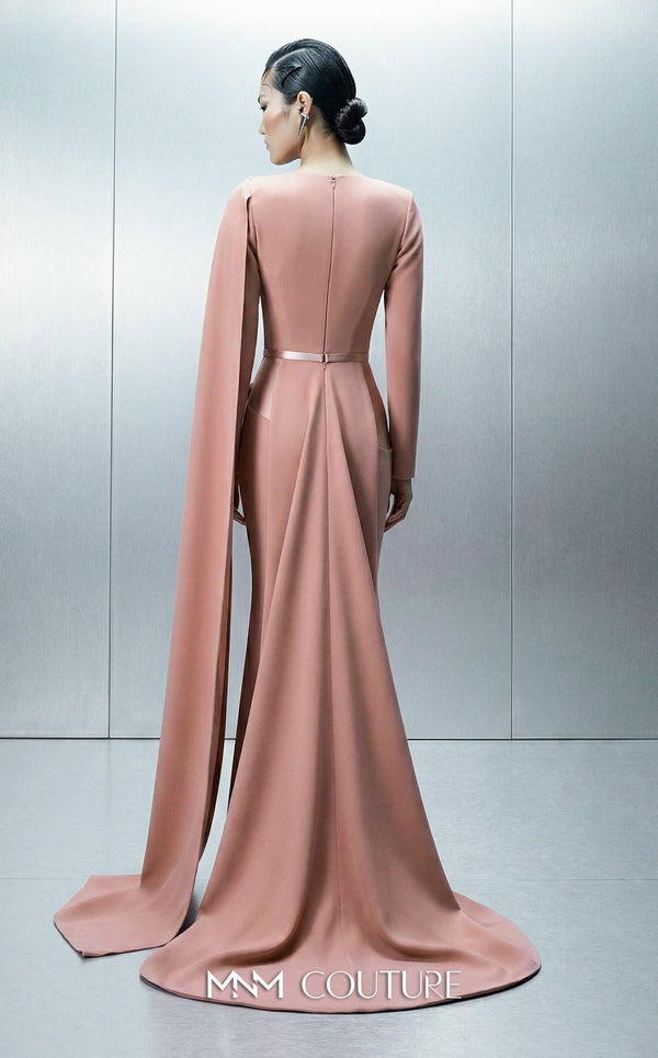 Long fitted crepe gown featuring a close neck, asymmetrical bodice, and one long sleeve highlighting MNM Couture Style E0166 | Couture Shop LA.