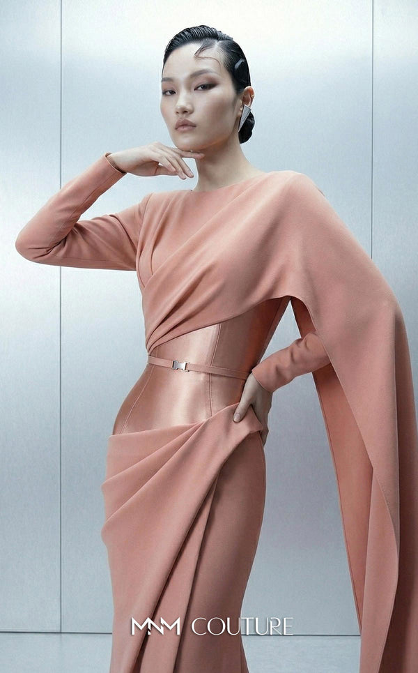 Long fitted crepe gown featuring a close neck, asymmetrical bodice, and one long sleeve highlighting MNM Couture Style E0166 | Couture Shop LA.