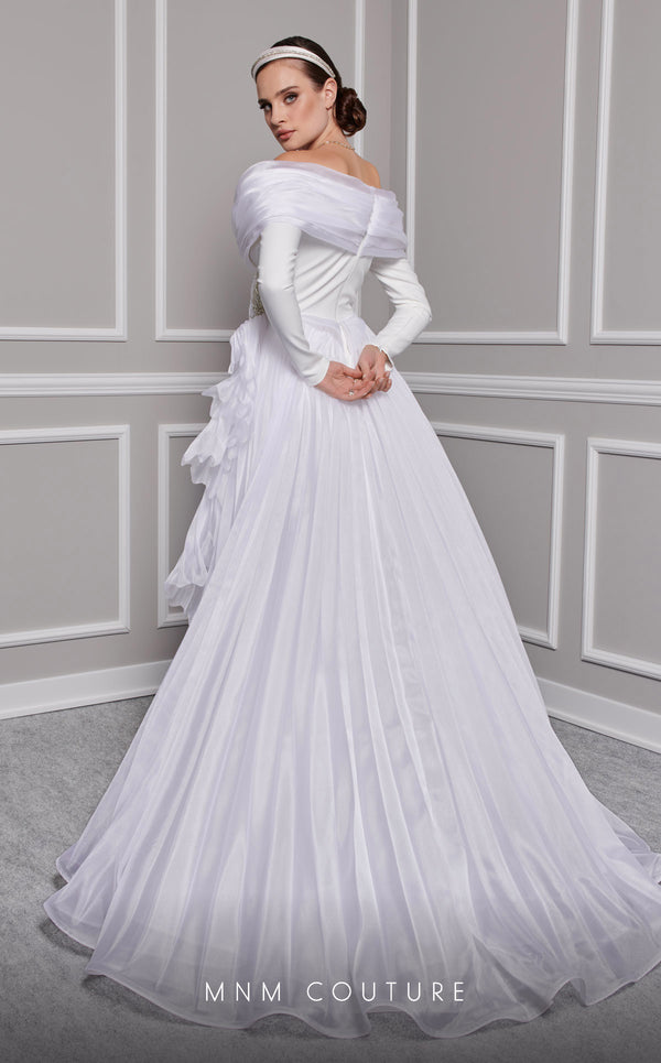 MNM Couture F02800: Off-shoulder crepe & organza gown, long sleeves, tassels, draped bust, Roman skirt, plisse tail. | Couture Shop LA