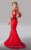 MNM Couture F02829 vibrant red mermaid gown with a criss-cross high neckline and cutouts along the long sleeves. | Couture Shop LA