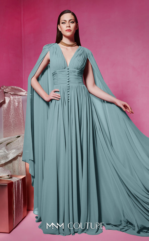 MNM Couture Style F02845 red evening dress with cape-style long sleeves, V-neckline, tailored waistline adorned with buttons, and long flowing train | Couture Shop LA.