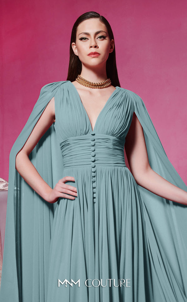 MNM Couture Style F02845 red evening dress with cape-style long sleeves, V-neckline, tailored waistline adorned with buttons, and long flowing train | Couture Shop LA.