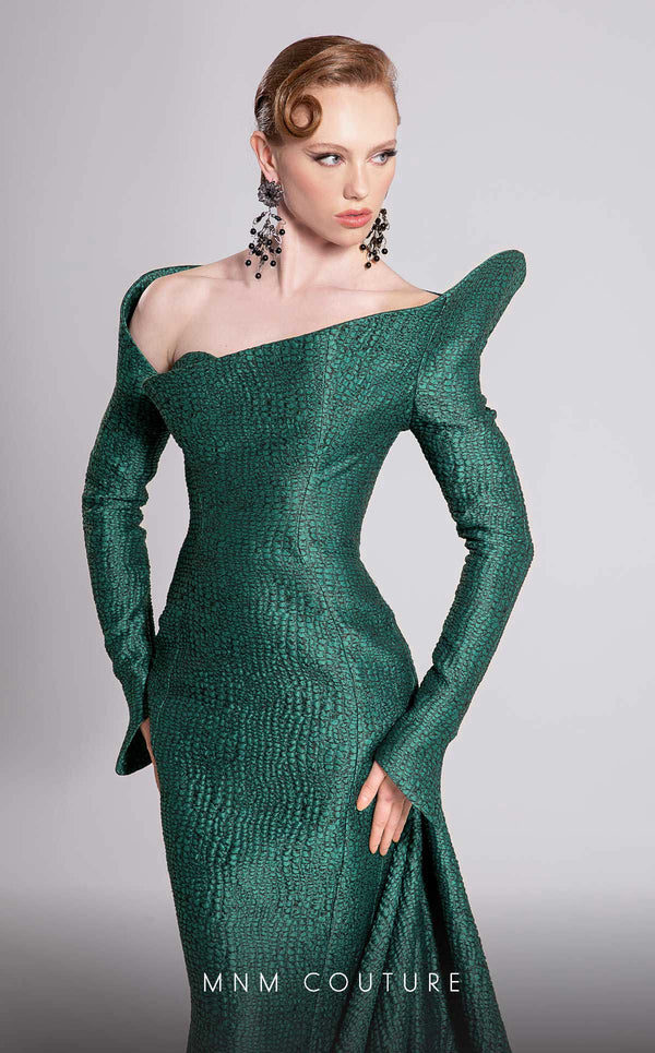 MNM Couture Style F02910 jacquard fitted dress featuring an asymmetrical off-shoulder neckline, long sleeves, a scoop back, and an undetachable back skirt with a dramatic train | Couture Shop LA