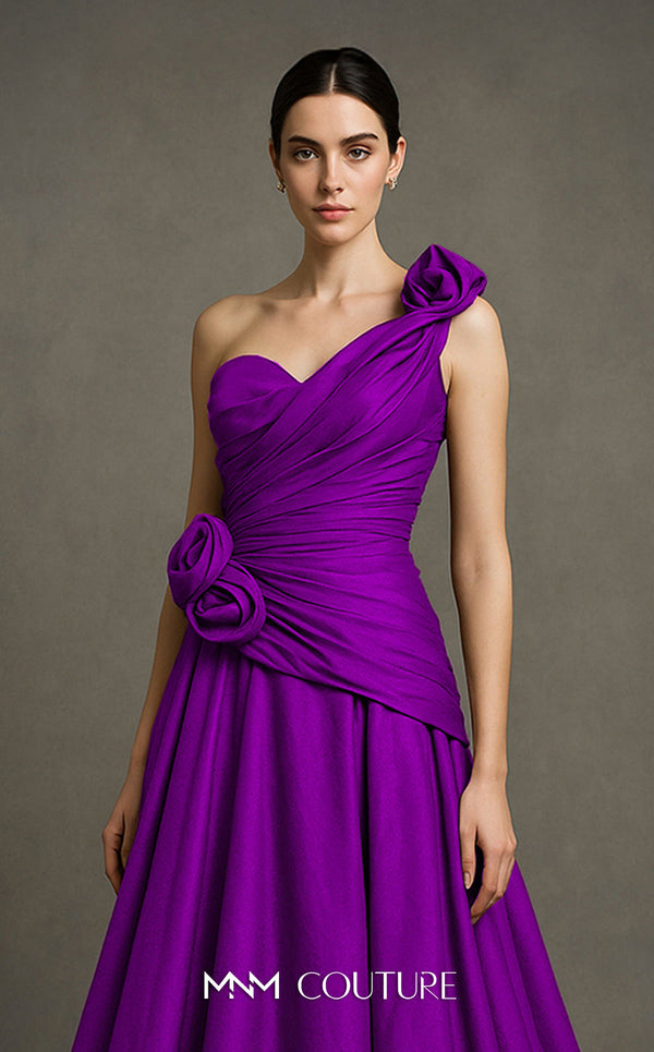 MNM Couture Style F02923 A-line gown featuring asymmetric neckline, fabric flower strap detail, pleated bust, and two floral accents at the waist | Couture Shop LA