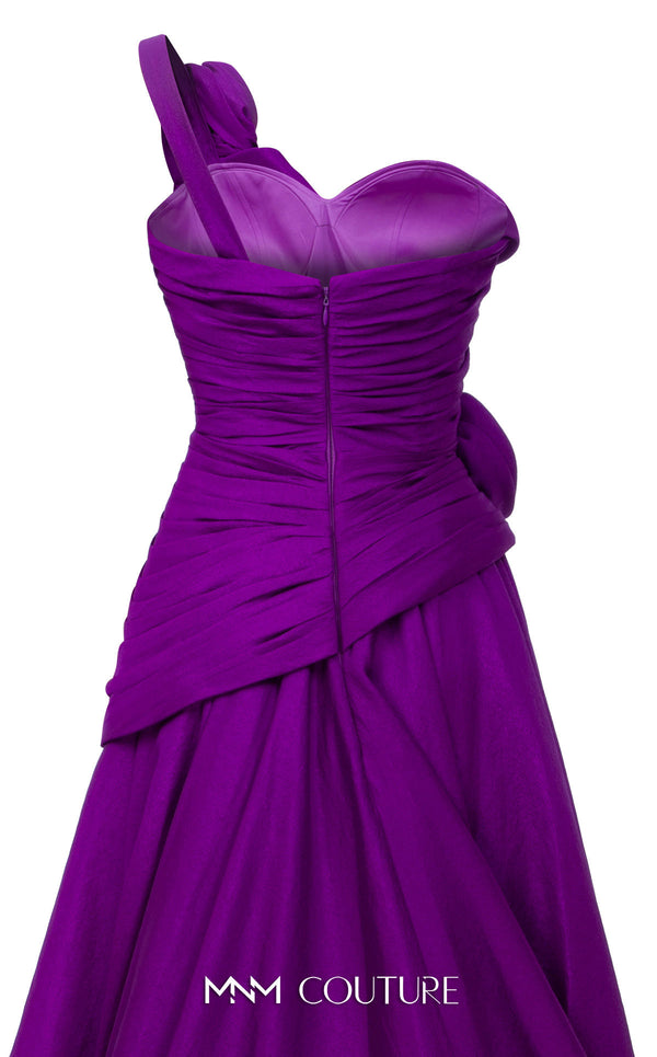 MNM Couture Style F02923 A-line gown featuring asymmetric neckline, fabric flower strap detail, pleated bust, and two floral accents at the waist | Couture Shop LA