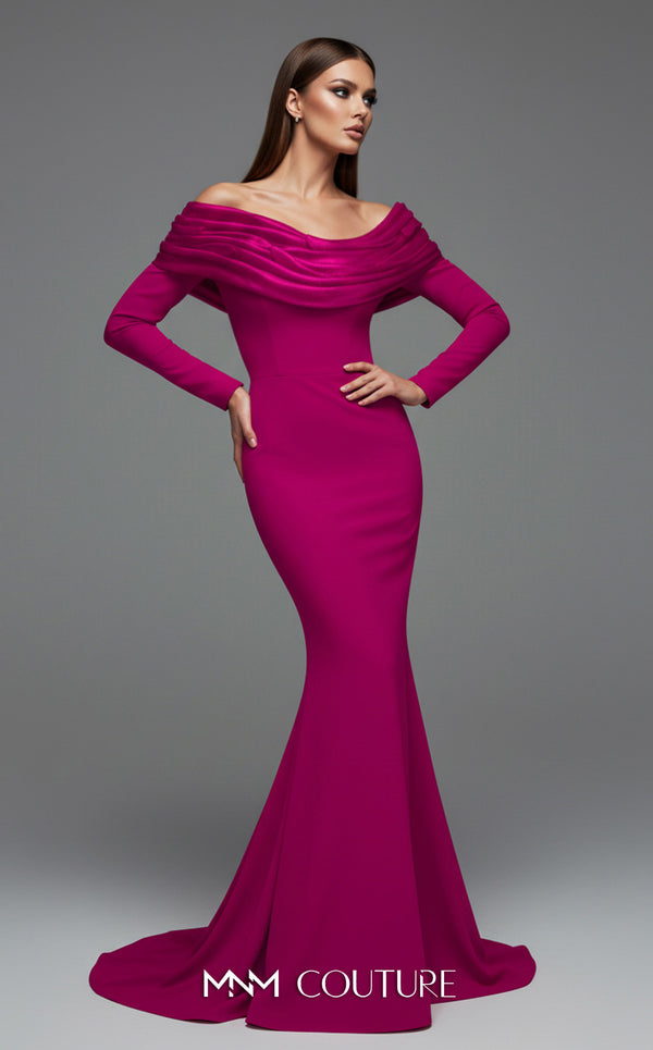 MNM Couture Style F02928 showcasing a dramatic mermaid silhouette dress in vibrant fuchsia, olive, or pink crepe, featuring pleated straight-across neckline, off-shoulder long sleeves, and a flowing train. | Couture Shop LA.