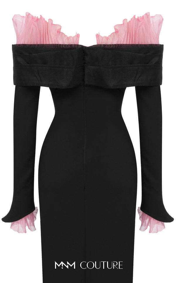 MNM Couture Style F02941 showing a black form-fitting evening gown with a pink off-the-shoulder ruffle detail, matching ruffled cuffs on the long sleeves, and a high back slit. | Couture Shop LA