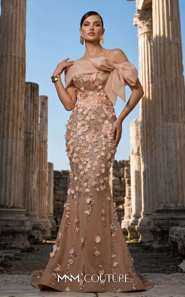MNM Couture F02950A soft mesh mermaid gown with laser-cut floral appliqués, sequin shimmer, and draped sheer bow neckline | Couture Shop LA.