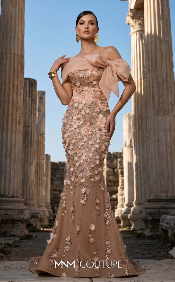 MNM Couture F02950A soft mesh mermaid gown with laser-cut floral appliqués, sequin shimmer, and draped sheer bow neckline | Couture Shop LA.