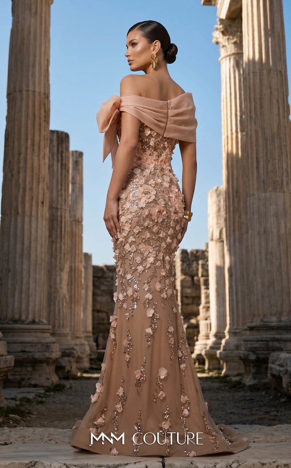 MNM Couture F02950A soft mesh mermaid gown with laser-cut floral appliqués, sequin shimmer, and draped sheer bow neckline | Couture Shop LA.