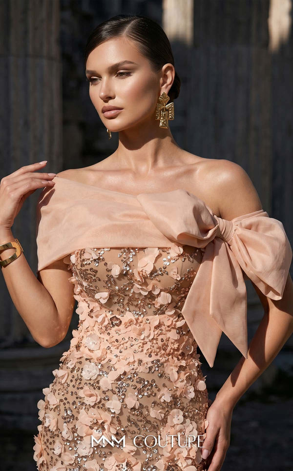 MNM Couture F02950A soft mesh mermaid gown with laser-cut floral appliqués, sequin shimmer, and draped sheer bow neckline | Couture Shop LA.
