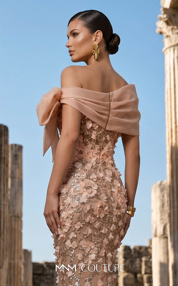 MNM Couture F02950A soft mesh mermaid gown with laser-cut floral appliqués, sequin shimmer, and draped sheer bow neckline | Couture Shop LA.
