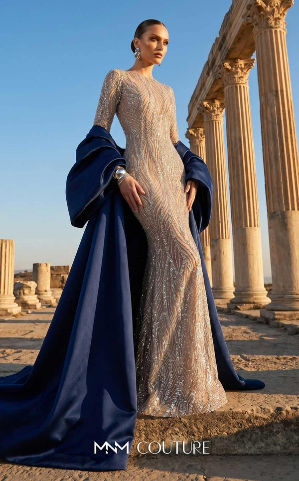 MNM Couture F03004 embroidered sequin mermaid gown with contrasting satin long cape, puffy sleeves, small train, and fitted silhouette | Couture Shop LA.