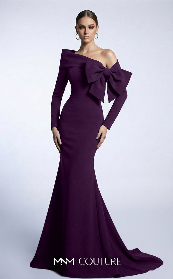 MNM Couture F03007 mint crepe long-sleeve mermaid gown with asymmetric large folded boat neckline, bare left shoulder, and oversized flat sculptural bow at the bust | Couture Shop LA