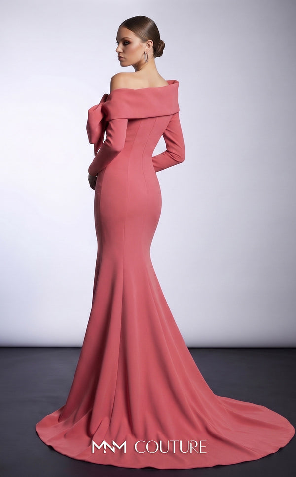 MNM Couture F03007 mint crepe long-sleeve mermaid gown with asymmetric large folded boat neckline, bare left shoulder, and oversized flat sculptural bow at the bust | Couture Shop LA