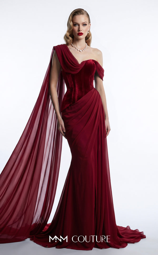 MNM Couture F03017A velvet corset mermaid gown with sweetheart neckline, left velvet strap, right-shoulder floor-length chiffon cape, and Grecian toga chiffon overskirt | Couture Shop LA