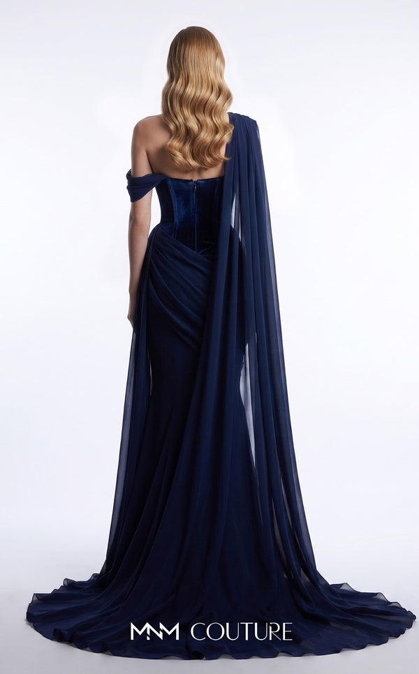 MNM Couture F03017A velvet corset mermaid gown with sweetheart neckline, left velvet strap, right-shoulder floor-length chiffon cape, and Grecian toga chiffon overskirt | Couture Shop LA