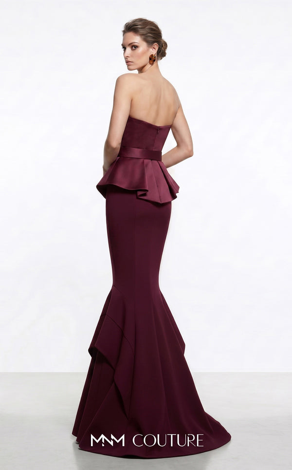 MNM Couture F03035A strapless crepe and satin mermaid gown with surplice sweetheart neckline, self-covered belt, angular peplum, and handkerchief double-tiered tail | Couture Shop LA.