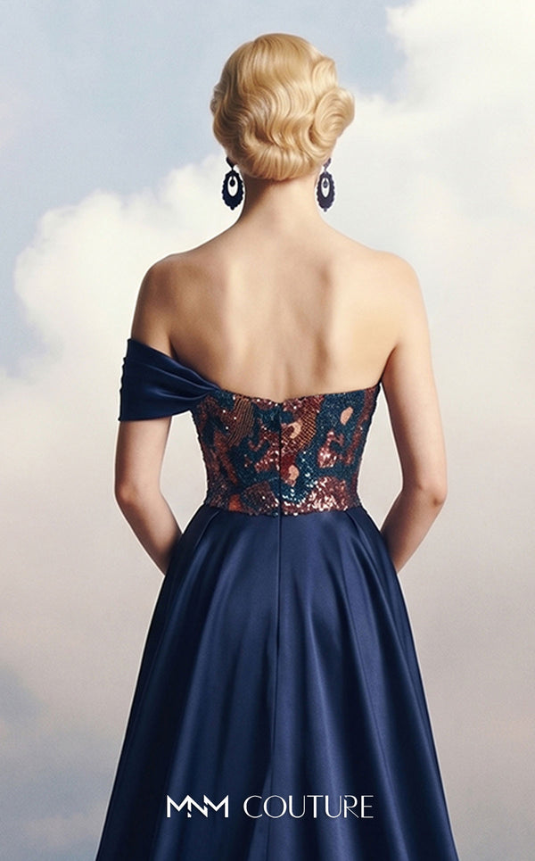 MNM Couture F03044 navy duchess satin gown with diagonal off-shoulder drape, sculptural right-shoulder petal, multicolor sequin-embroidered column, open-front A-line overskirt, and open back | Couture Shop LA.
