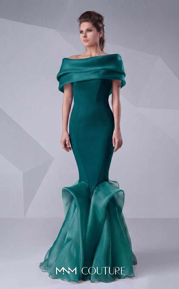A refined MNM Couture G0620 mermaid gown with off-shoulder sleeves, ruched detailing, and a contoured silhouette for impactful elegance. | Couture Shop LA