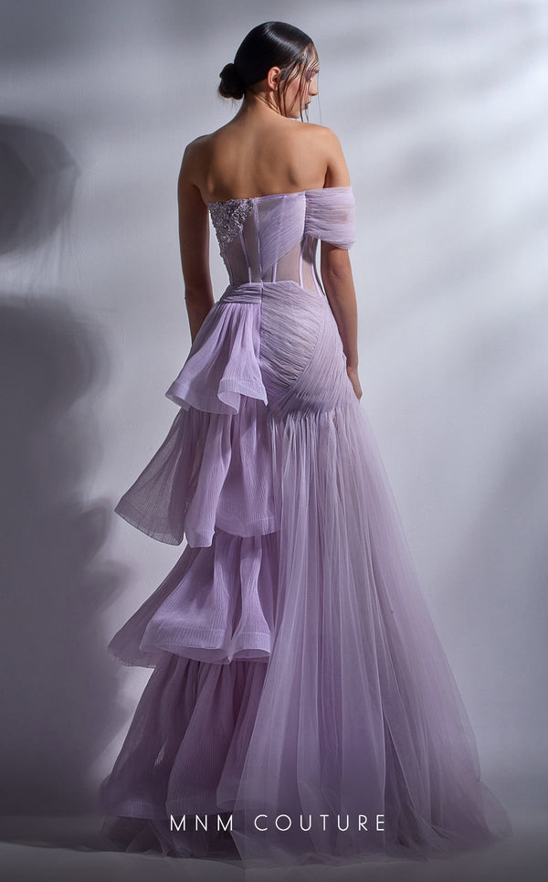 MNM Couture G1282 trendy gown with boned corset, beaded trim, and asymmetrical tulle skirt. | Couture Shop LA