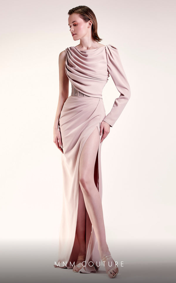 MNM Couture G1408 one-sleeve crepe column gown with boatneck neckline, rhinestone corseted waist, and draped floor-length skirt with slit | Couture Shop LA.