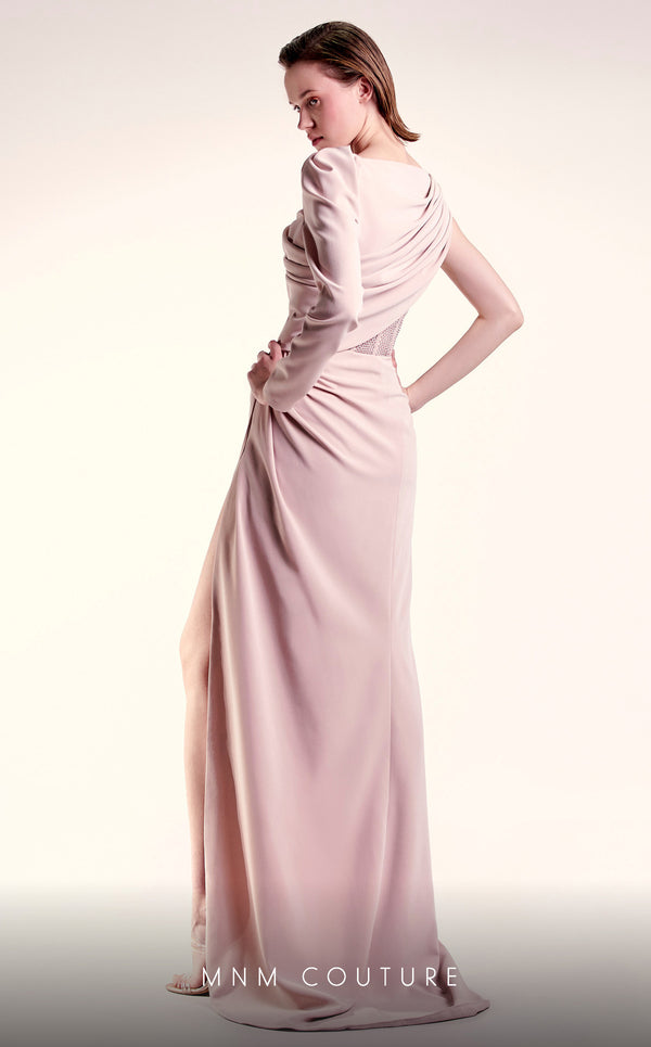 MNM Couture G1408 one-sleeve crepe column gown with boatneck neckline, rhinestone corseted waist, and draped floor-length skirt with slit | Couture Shop LA.