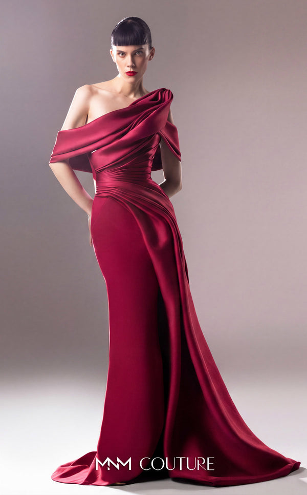 MNM Couture G1603 - Emerald green off-shoulder draped evening gown, featuring a crepe base, organza accents, and structured Piqué Mikado details. | Couture Shop LA