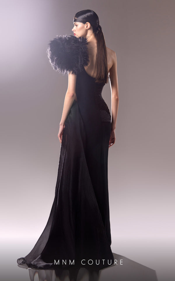 MNM Couture G1618 gown showcasing the chic one-shoulder design and cascading drapes. | Couture Shop LA