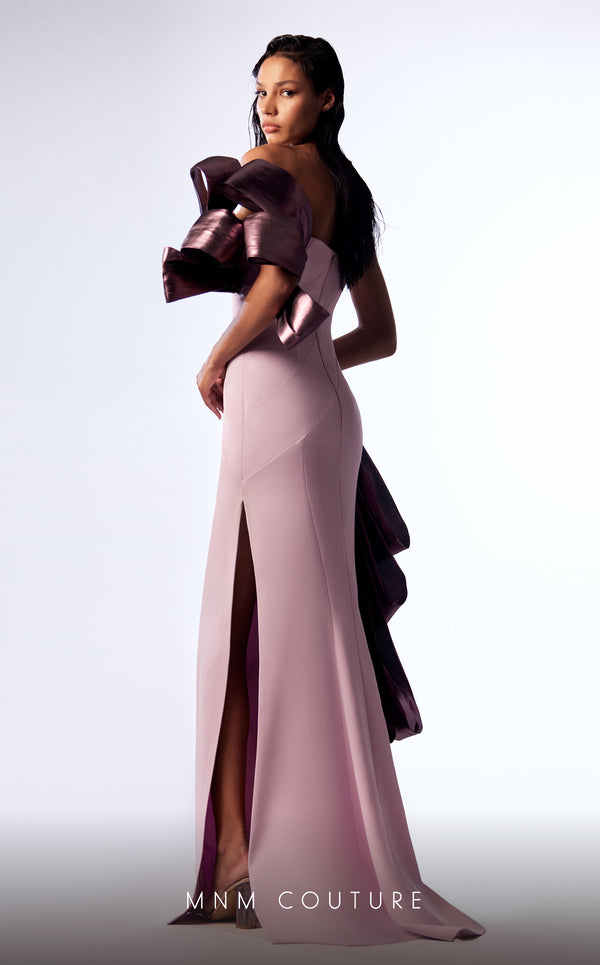 MNM Couture G1713 gown displaying the dramatic silhouette and eye-catching details. | Couture Shop LA