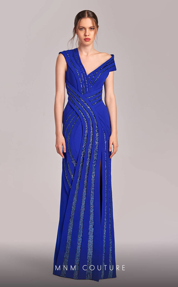 MNM Couture Style G1833 royal blue rayon crepe column gown featuring a pleated bust, asymmetric V-neckline, off-shoulder strap sleeve, and elegant slit above the knee