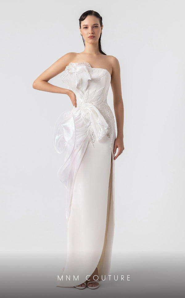 MNM Couture G1903 pearly off-white holographic gown with cascading peplum and high-slit detailing. | Couture Shop LA
