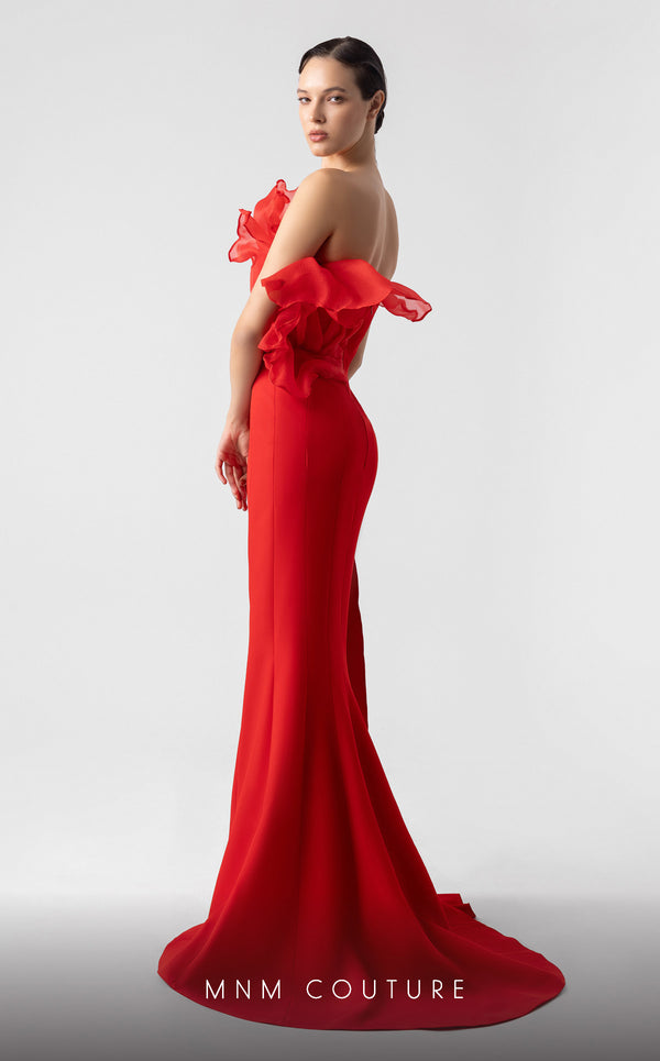 MNM Couture G1917 red mermaid gown with a plunging V-bodice and bold ruffled details. | Couture Shop LA