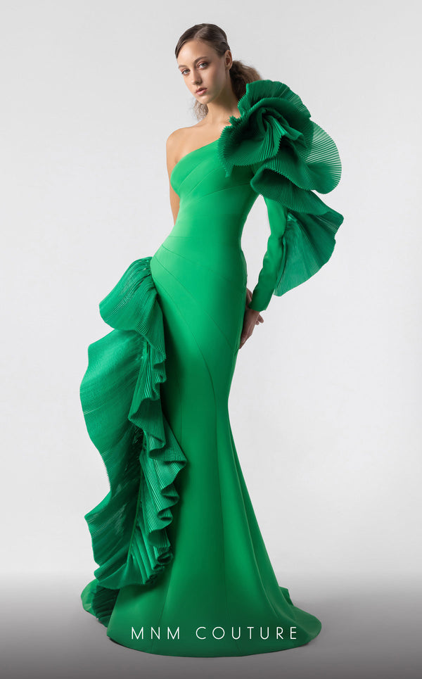 MNM Couture G1918 emerald green mermaid gown with bold one-sleeve ruffle detailing. | Couture Shop LA